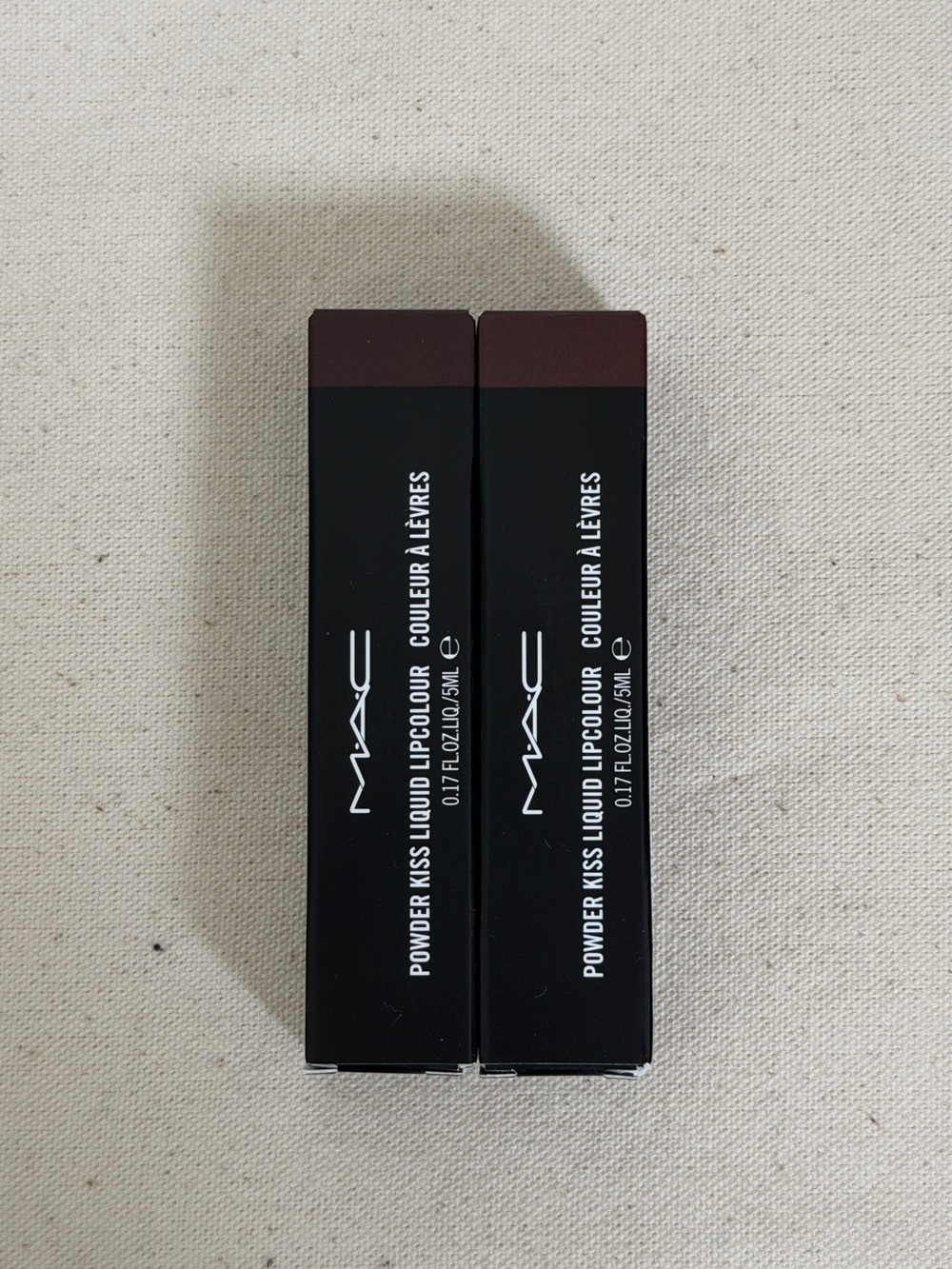 MAC Cosmetics Powder Kiss Liquid Lipcolour in Rekindled and Chestnut